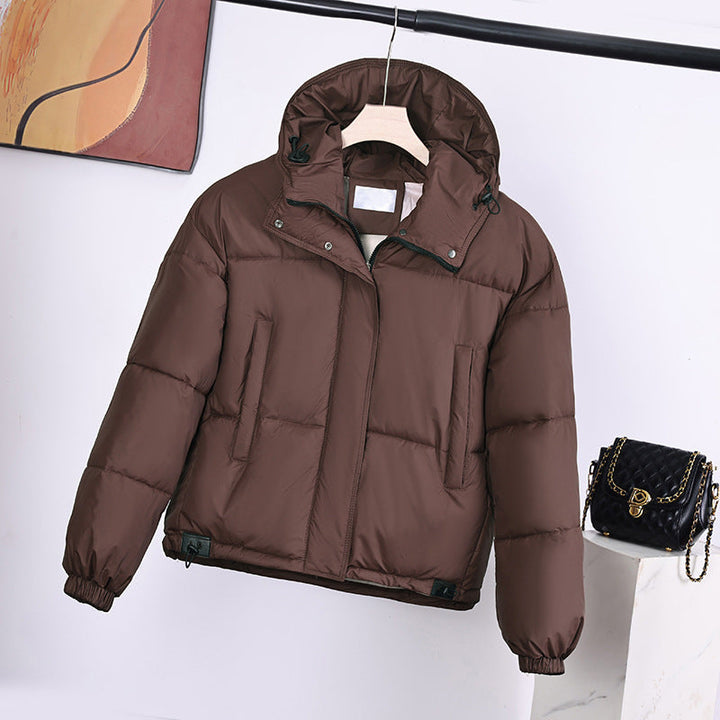 Women’s padded hooded jacket in a boxy cut with a concealed zipper placket