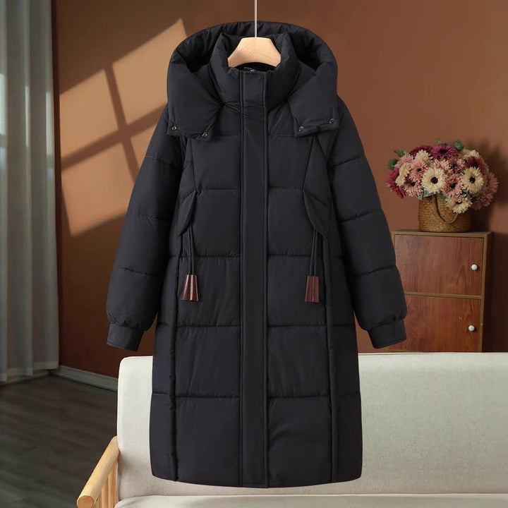 Women’s long padded hooded coat with a high stand-up collar and concealed zipper