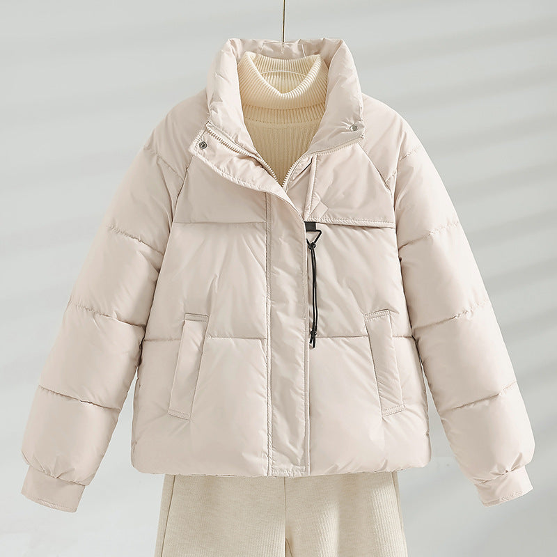 Women’s short padded boxy jacket with a high stand-up collar and drawstring