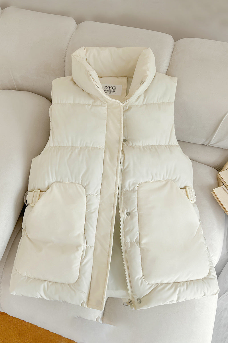 Women’s padded utility vest with stand-up collar and large flap pockets