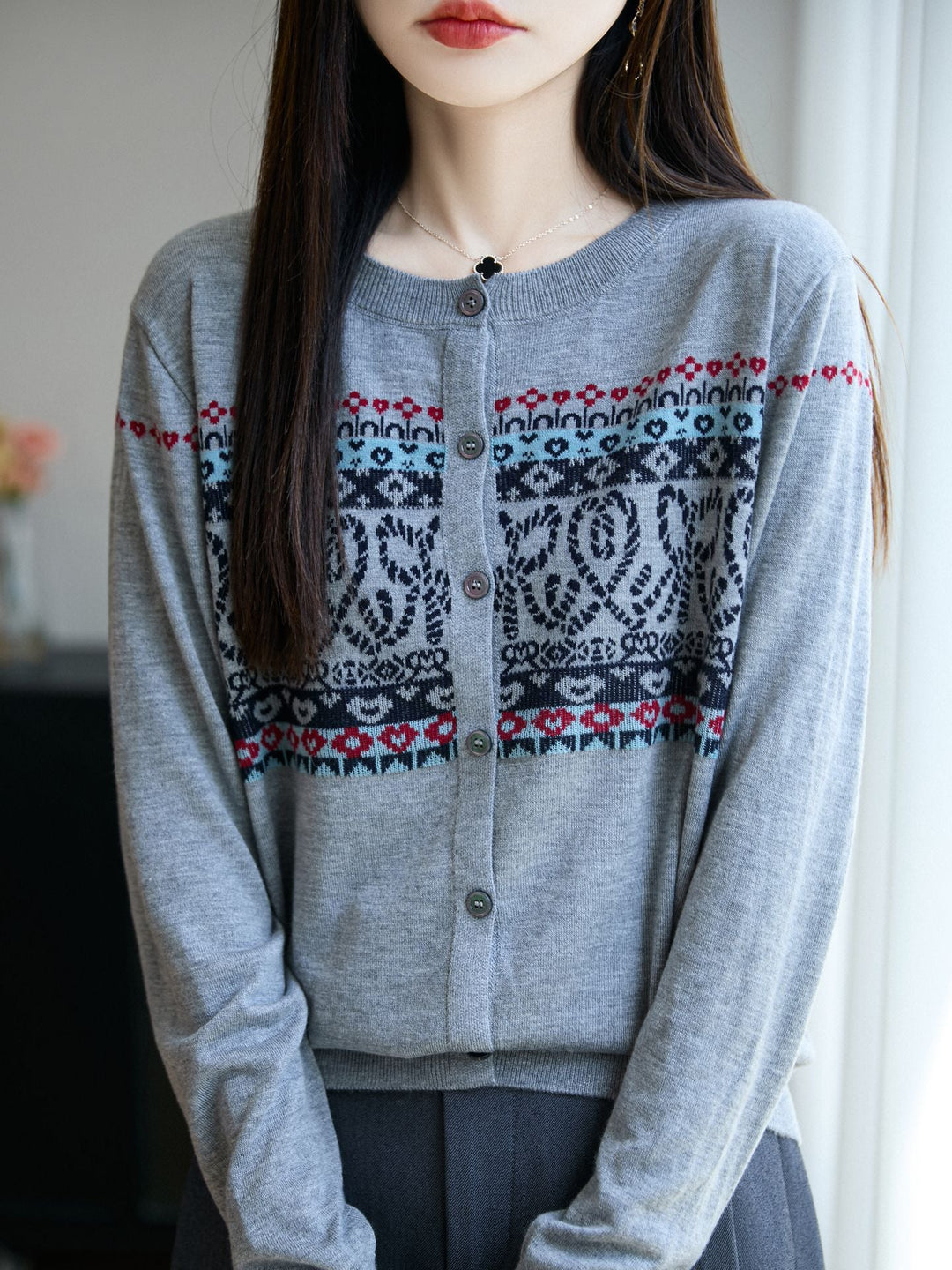 Women's cardigan with a round neckline and long sleeves