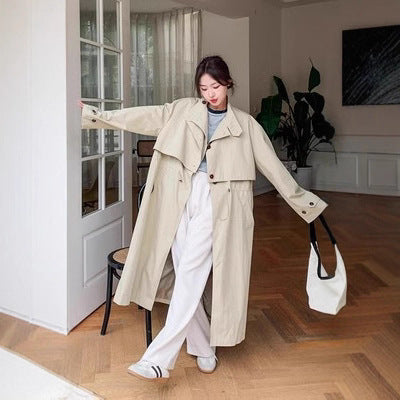 Women’s oversized trench coat with cape back and drawstring waist