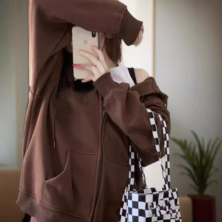Women's oversized hooded jacket with zipper, kangaroo pockets, and ribbed cuffs