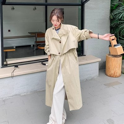 Women’s oversized trench coat with cape back and drawstring waist