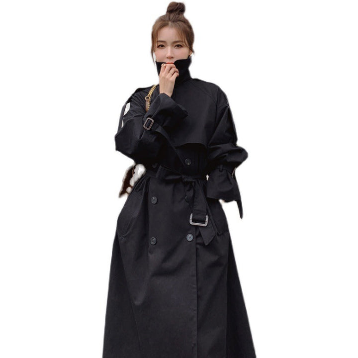 Women's oversized trench coat with double-breasted button fastening and storm flap