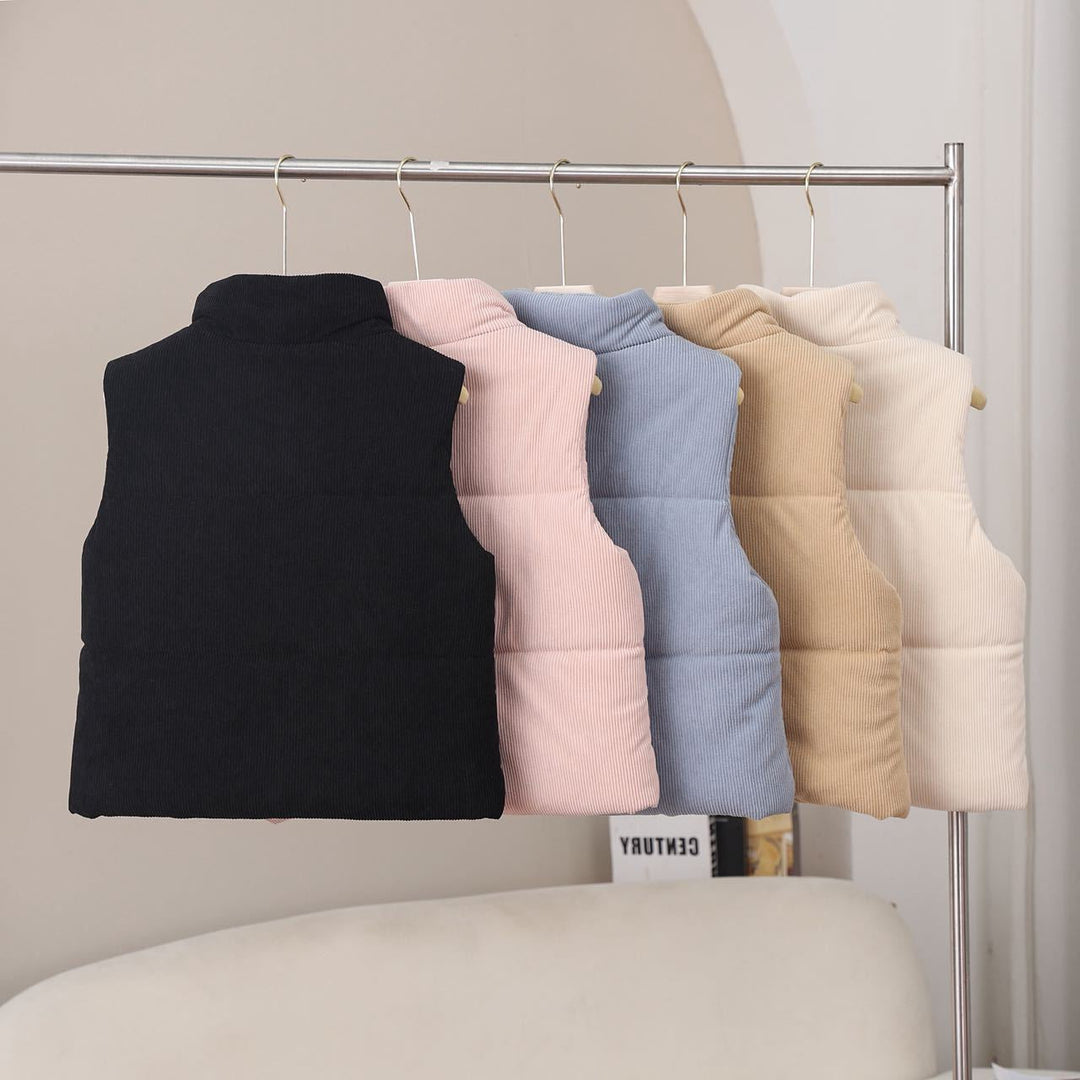 Women's short insulated vest with a high stand-up collar and snap-button placket