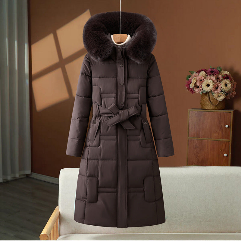 Women’s long quilted winter coat with detachable faux-fur collar and waist belt