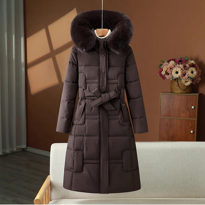 Women’s long quilted winter coat with detachable faux-fur collar and waist belt