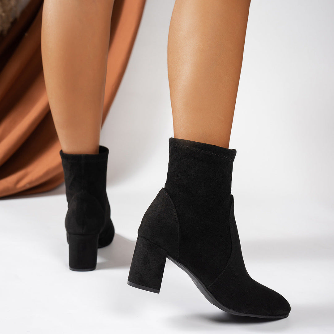 Women’s suede ankle boots with a block heel and cushioned insole