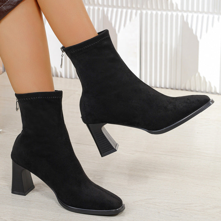 Women’s suede ankle boots with block heels and a zipper