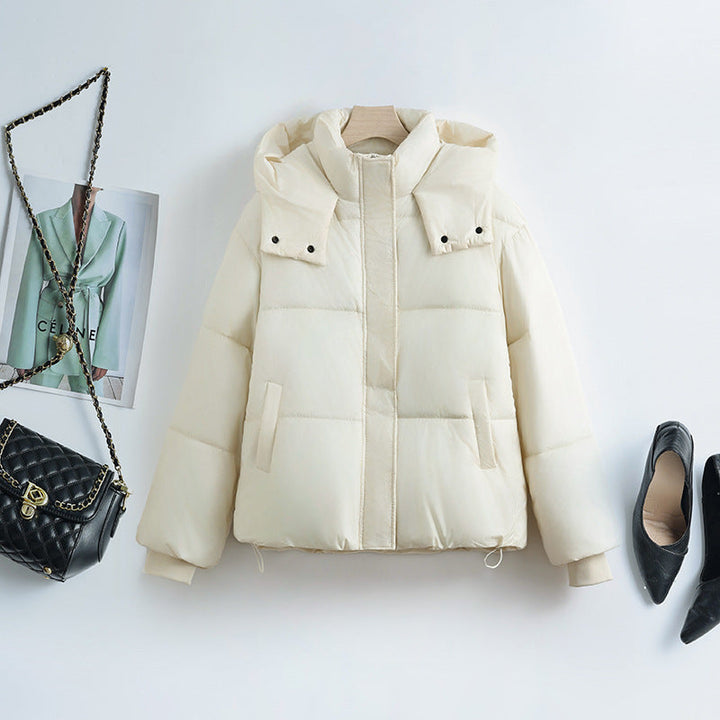 Women's short microfiber puffer jacket with removable collar padding and drawstring hem