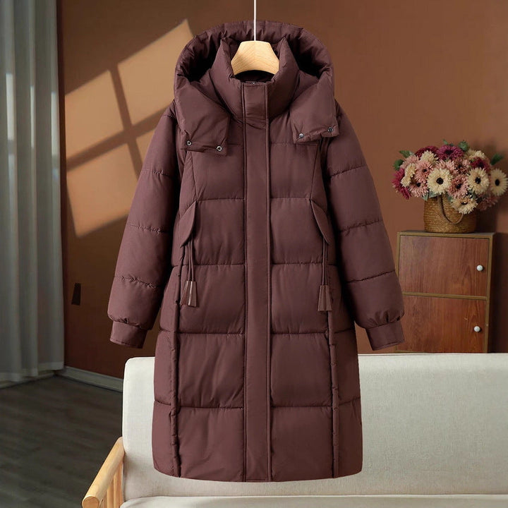Women’s long padded hooded coat with a high stand-up collar and concealed zipper