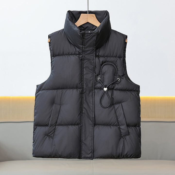 Women’s lightweight quilted padded vest with a high stand-up collar and cord trim