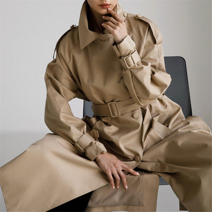 Women’s oversized trench coat with storm flap and detachable tie belt
