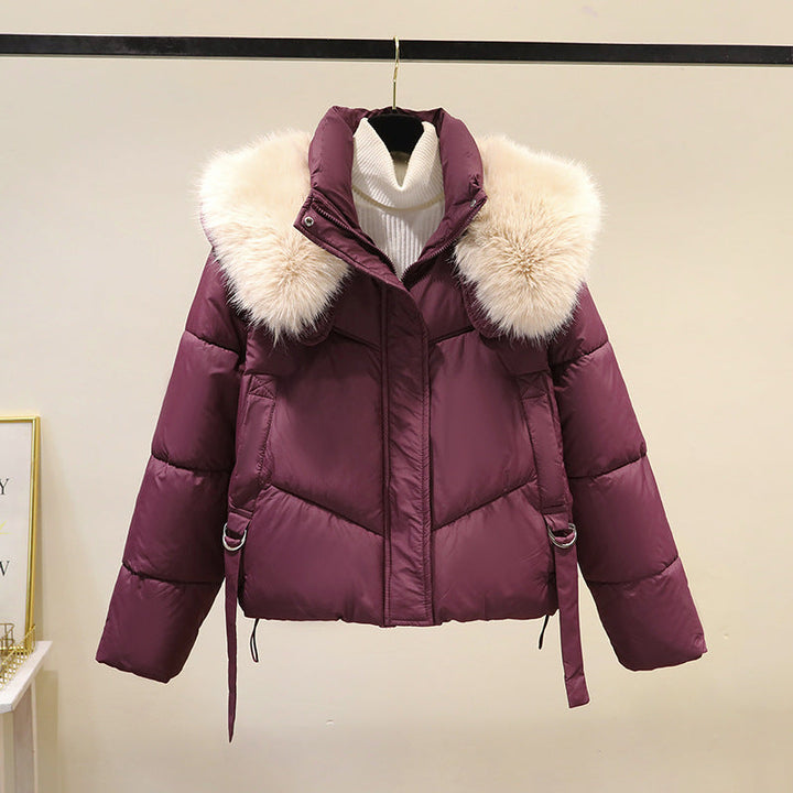 Women’s short quilted puffer jacket with a voluminous faux-fur collar and waist belt