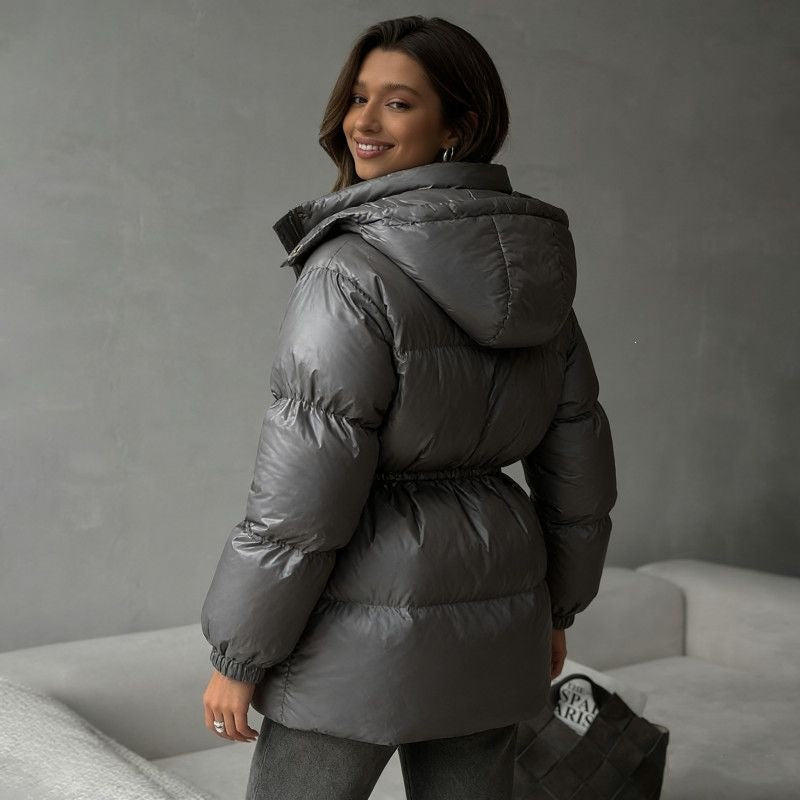 Women's hooded jacket with an adjustable waist drawstring and glossy finish