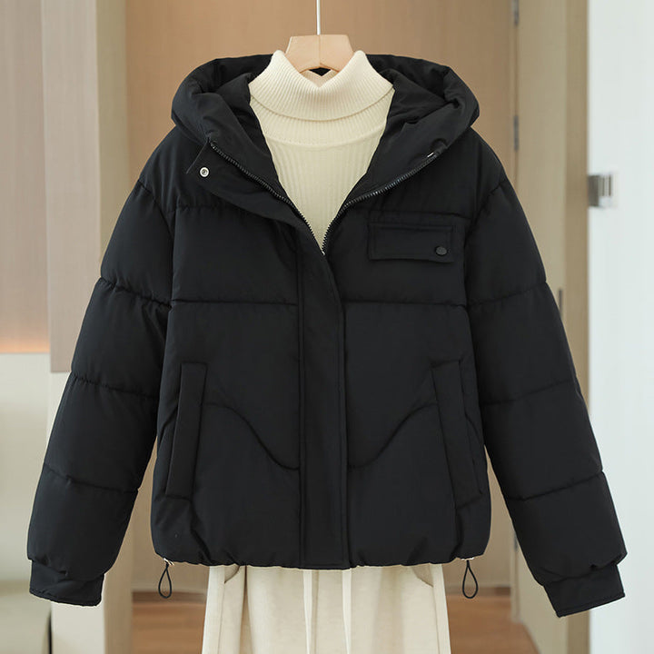 Women's short quilted hooded jacket with a concealed zipper
