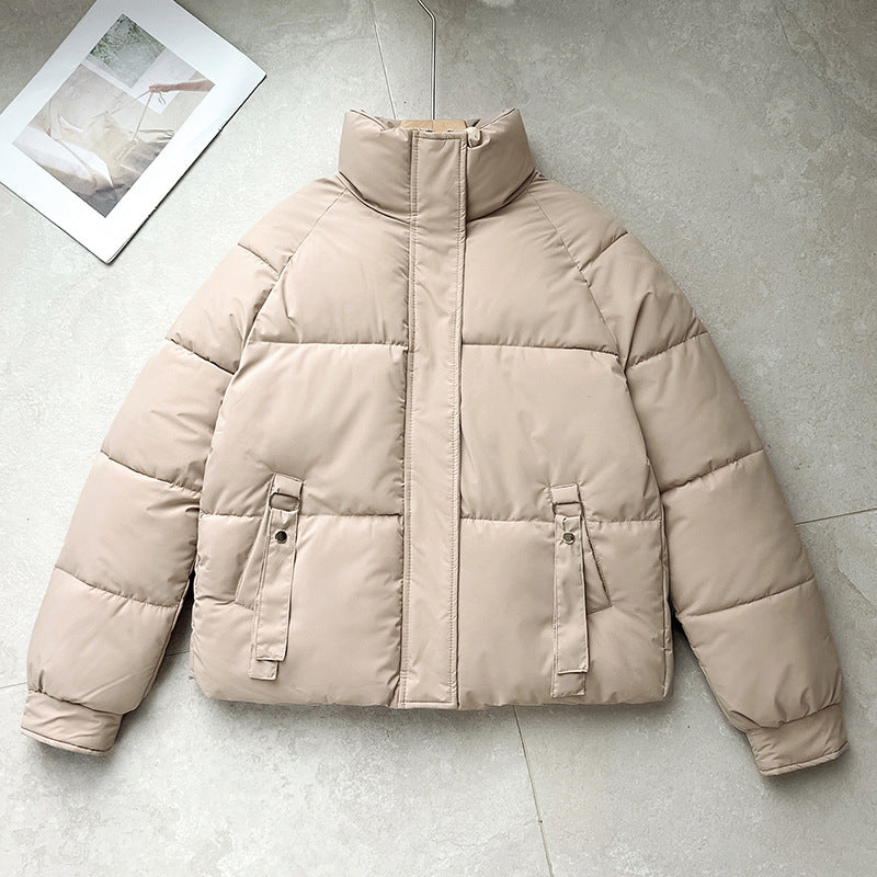Women’s short quilted jacket with a high stand-up collar and D-ring pocket