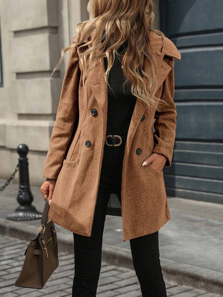Women's jacket with large buttons, a notched collar, and pockets