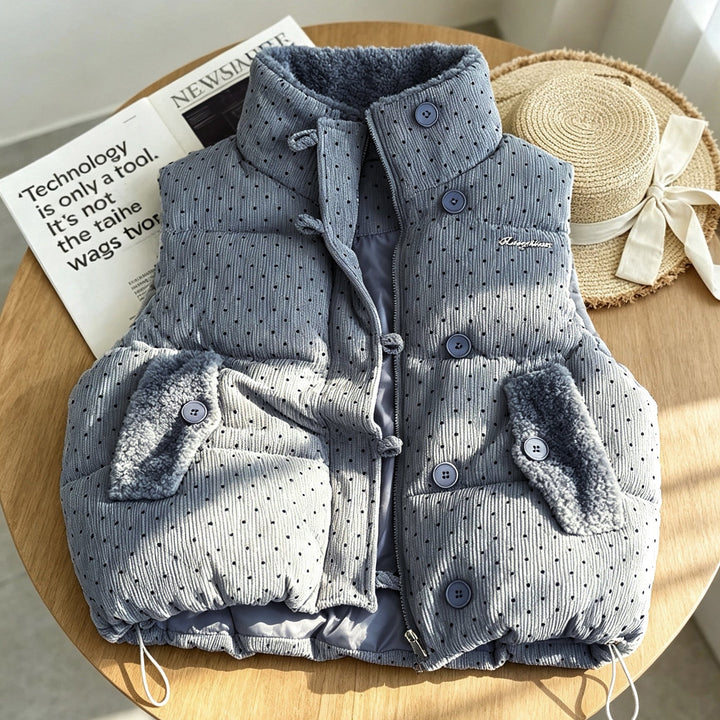 Women's padded quilted vest with teddy lining, stand-up collar, and drawstring hem