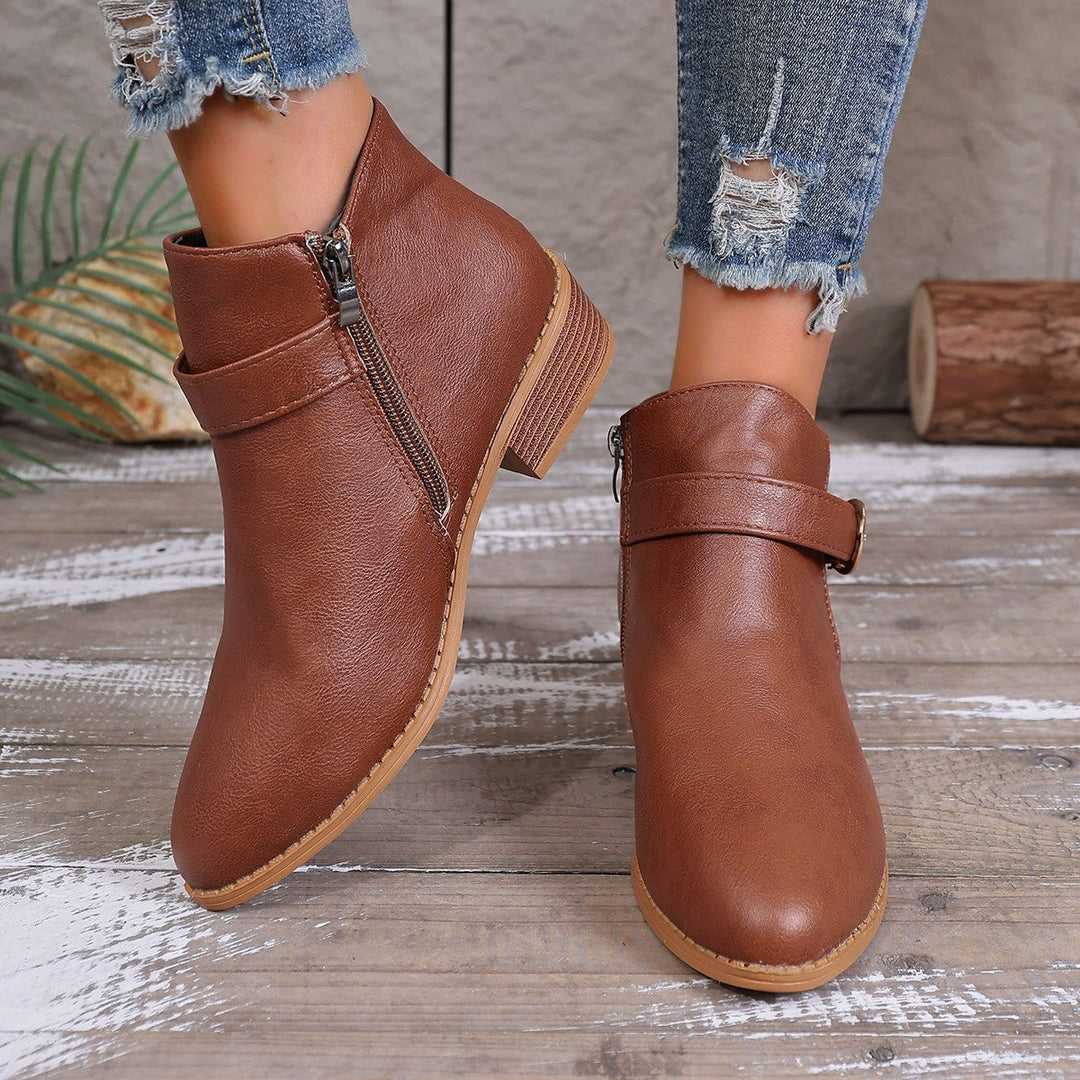 Women’s ankle boots with a cushioned footbed and practical zipper