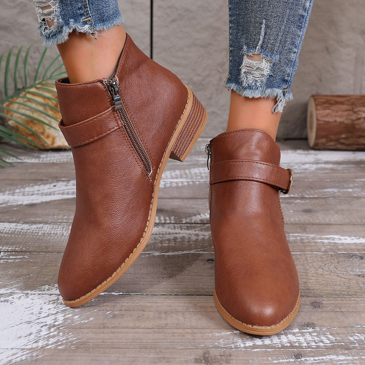 Women’s ankle boots with a cushioned footbed and practical zipper