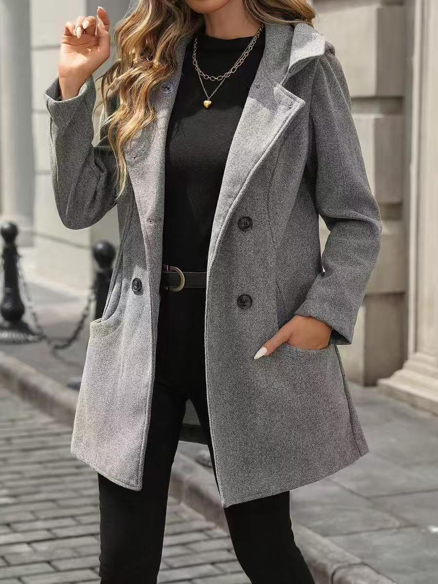 Women's jacket with large buttons, a notched collar, and pockets