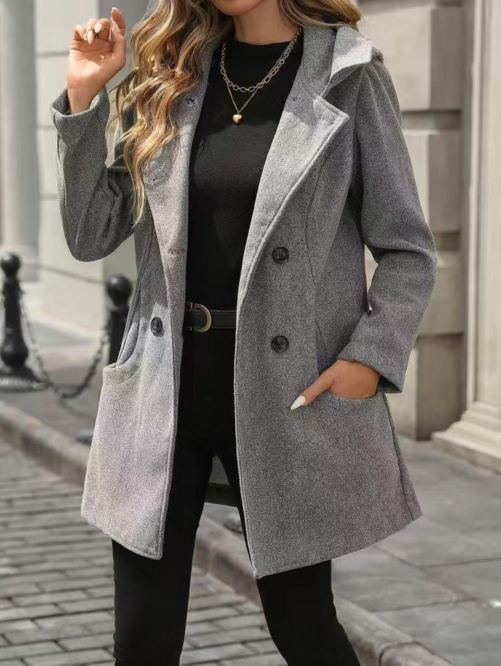 Women's jacket with large buttons, a notched collar, and pockets