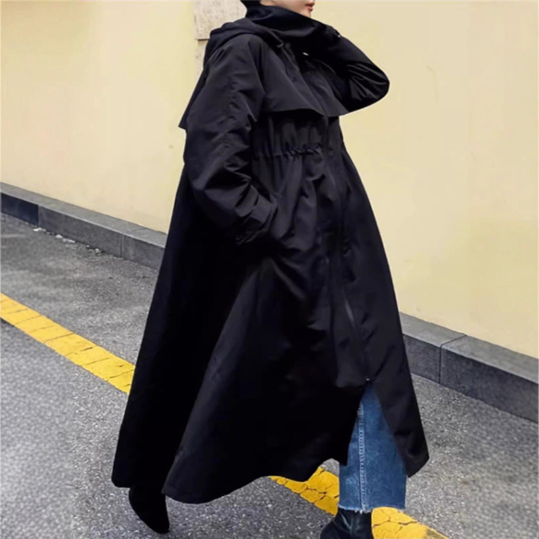 Women’s water-repellent oversized raincoat with hood and A-line silhouette