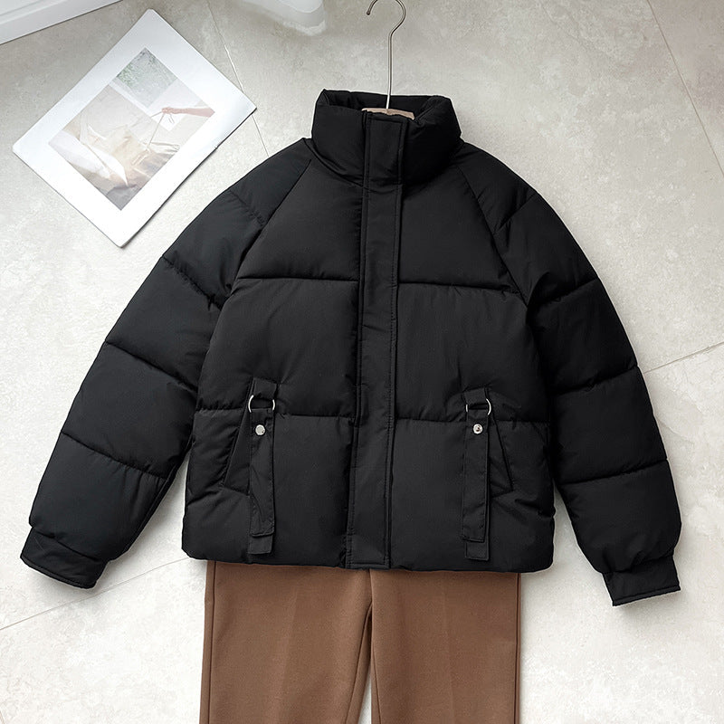 Women’s short quilted jacket with a high stand-up collar and D-ring pocket