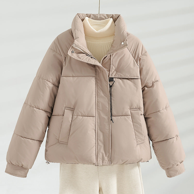 Women’s short padded boxy jacket with a high stand-up collar and drawstring