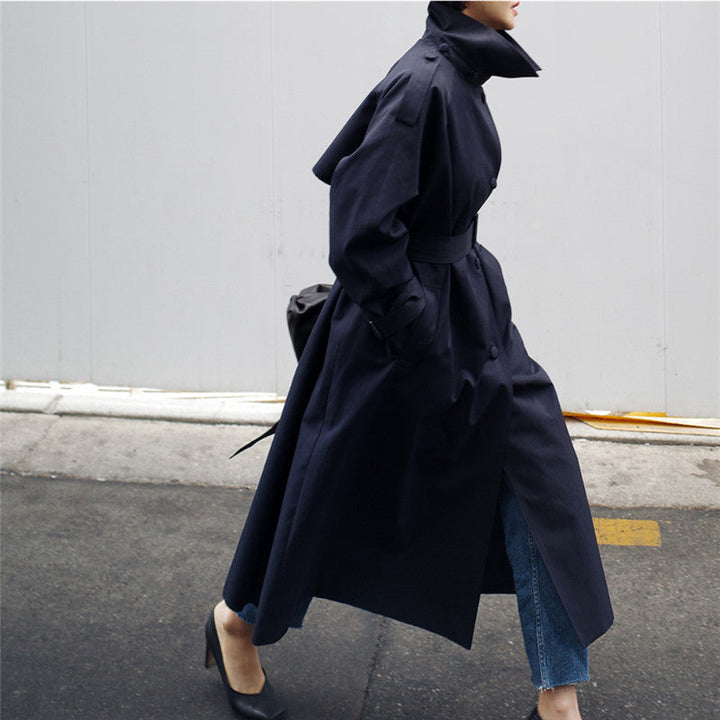 Women's long trench coat with waist belt and high stand-up collar