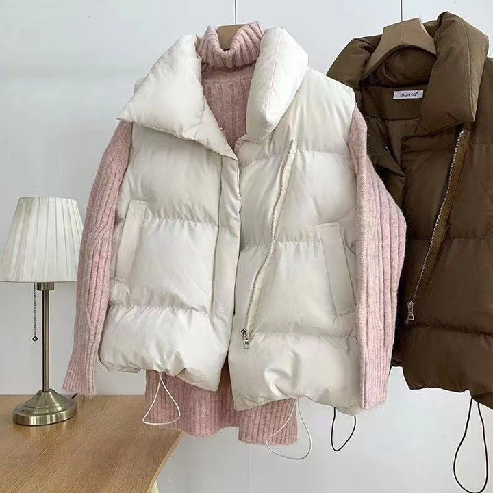 Women's padded quilted vest with shawl collar and adjustable drawstring hem