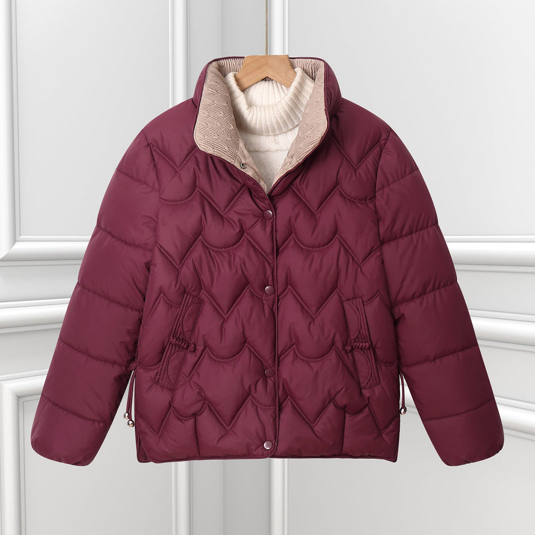 Women’s short quilted jacket with curved quilting and snap-button placket