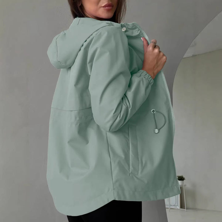 Women's outdoor jacket with adjustable hood and spacious pockets
