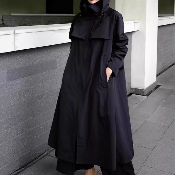 Women’s water-repellent oversized raincoat with hood and A-line silhouette