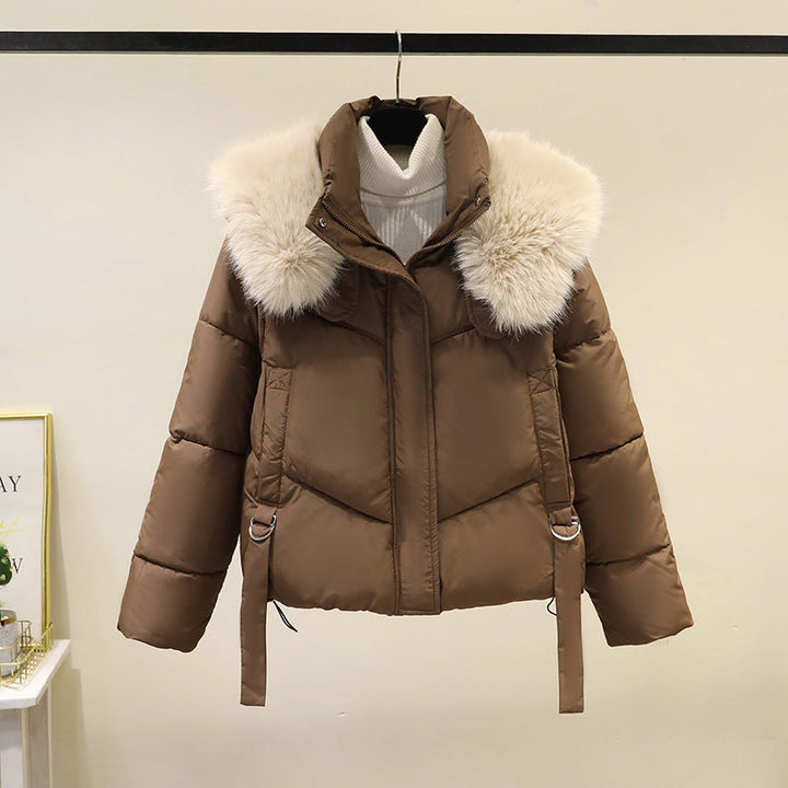 Women’s short quilted puffer jacket with a voluminous faux-fur collar and waist belt