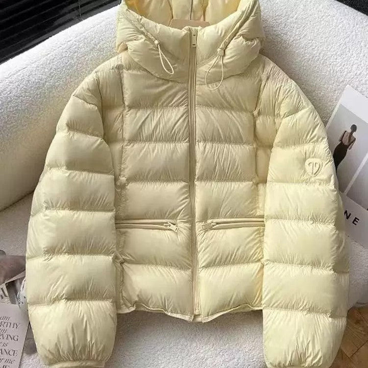 Women’s cropped thermal quilted jacket with hood and zippered pockets