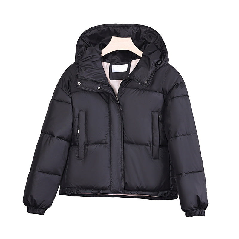Women’s padded hooded jacket in a boxy cut with a concealed zipper placket