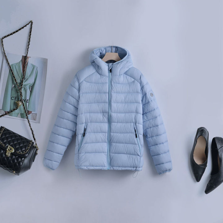 Women’s ultra-light quilted hooded jacket with an adjustable drawstring waist