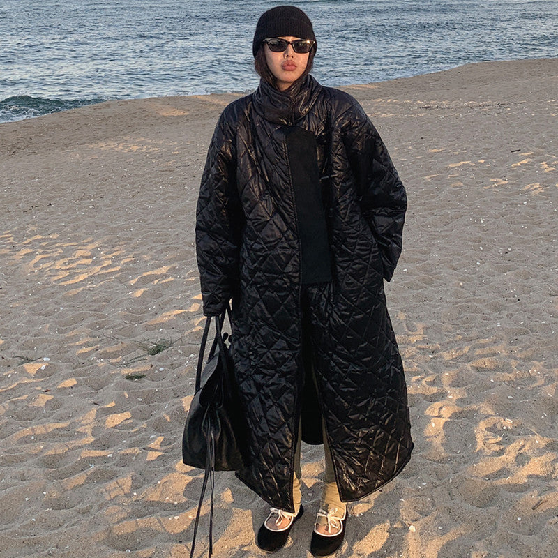 Women’s oversized quilted maxi-length coat with diamond quilting
