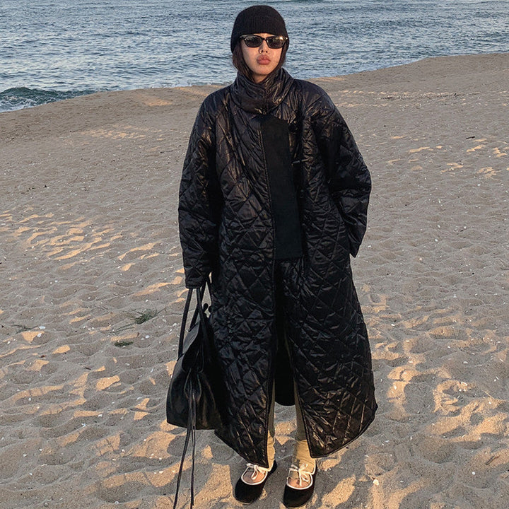 Women’s oversized quilted maxi-length coat with diamond quilting