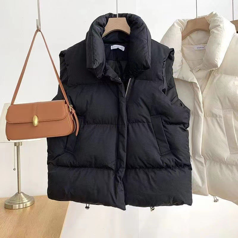 Women's padded quilted vest with shawl collar and adjustable drawstring hem