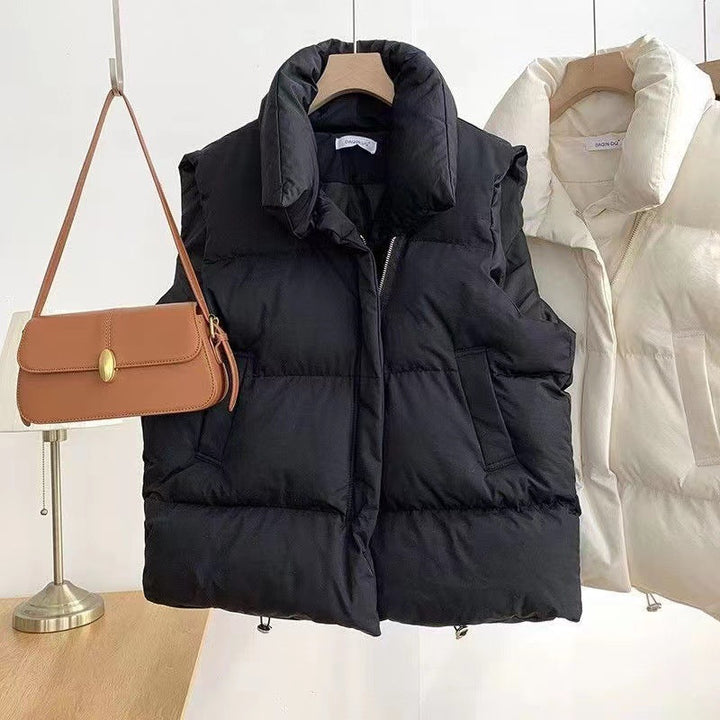 Women's padded quilted vest with shawl collar and adjustable drawstring hem