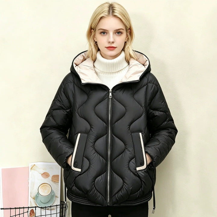 Women's padded short jacket with heart-shaped quilting, a rounded hem, and a hood