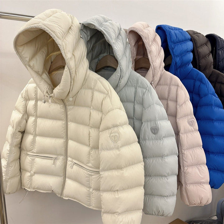 Women’s cropped thermal quilted jacket with hood and zippered pockets