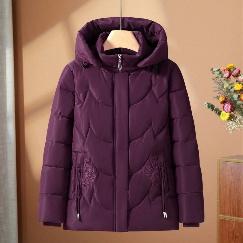 Women’s quilted thermal outdoor jacket with a hood and floral pocket embroidery