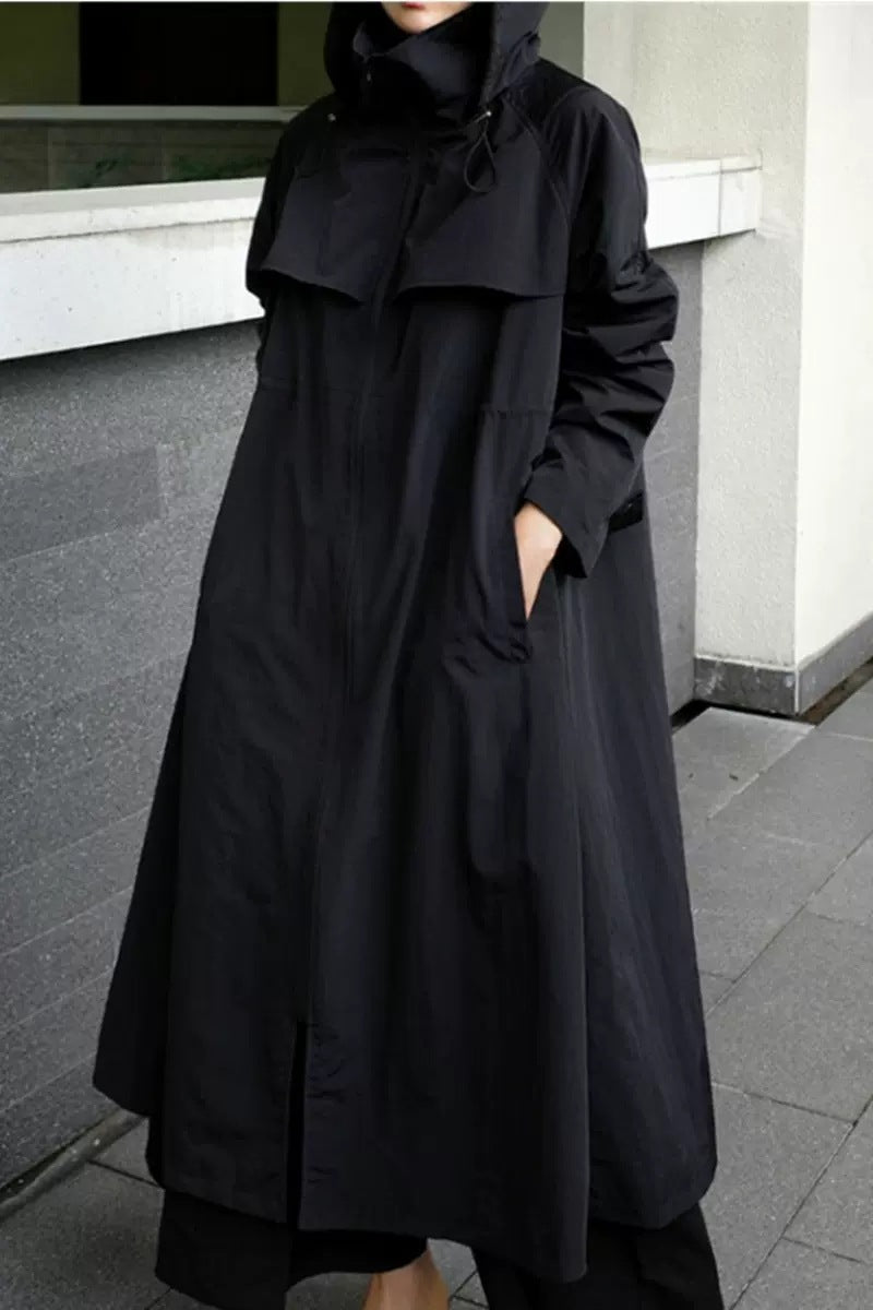 Women’s oversized maxi-length coat with hood and cape yoke
