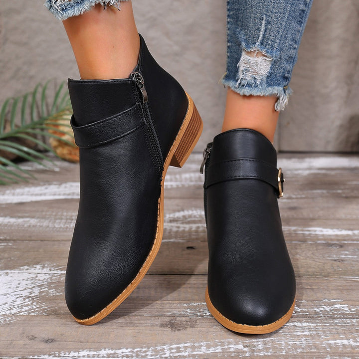 Women’s ankle boots with a cushioned footbed and practical zipper