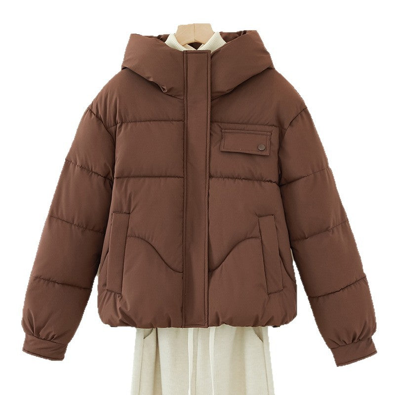 Women's short quilted hooded jacket with a concealed zipper